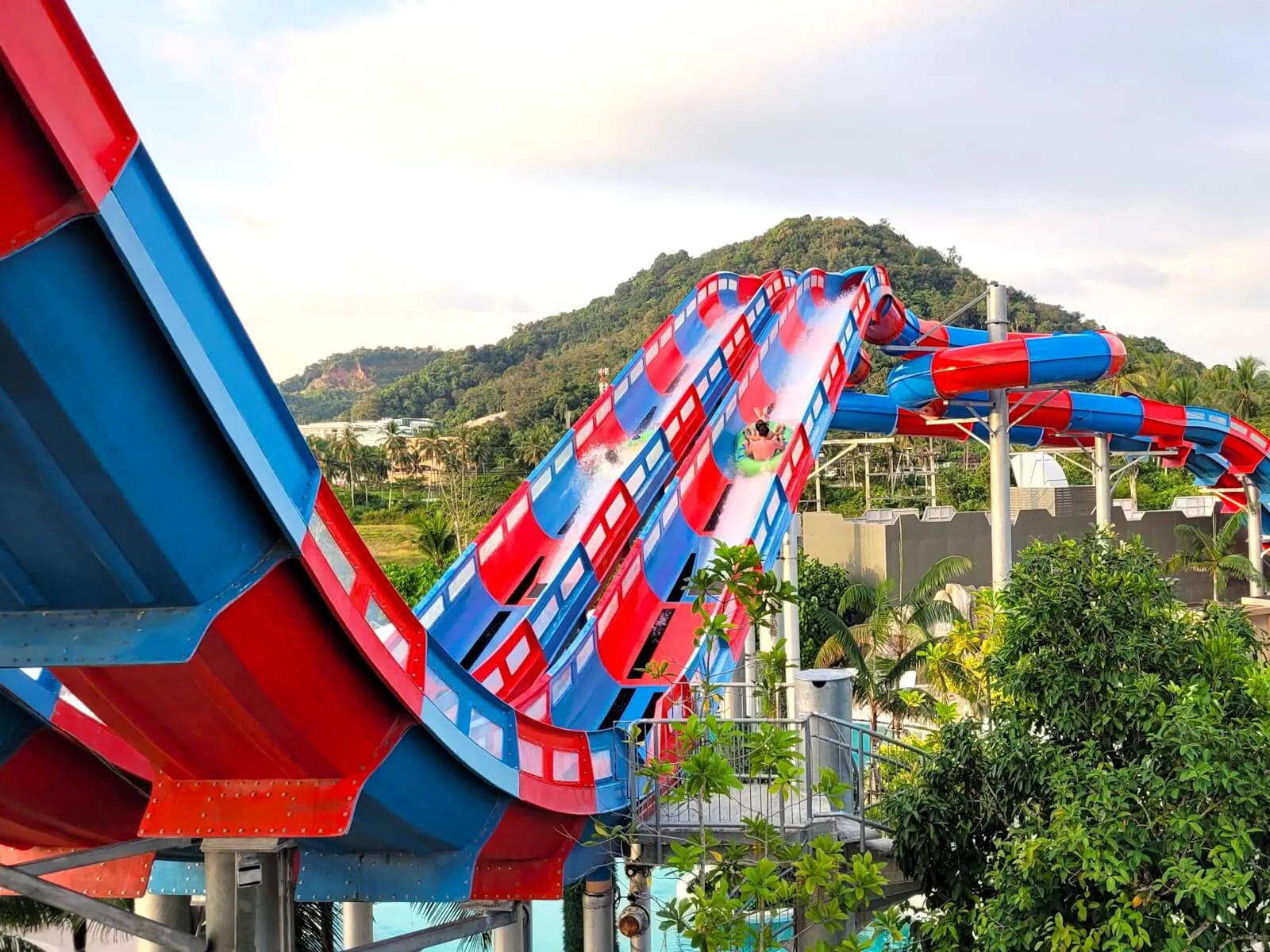 Rafts climbing the red and blue Angel's Slides Master Blaster